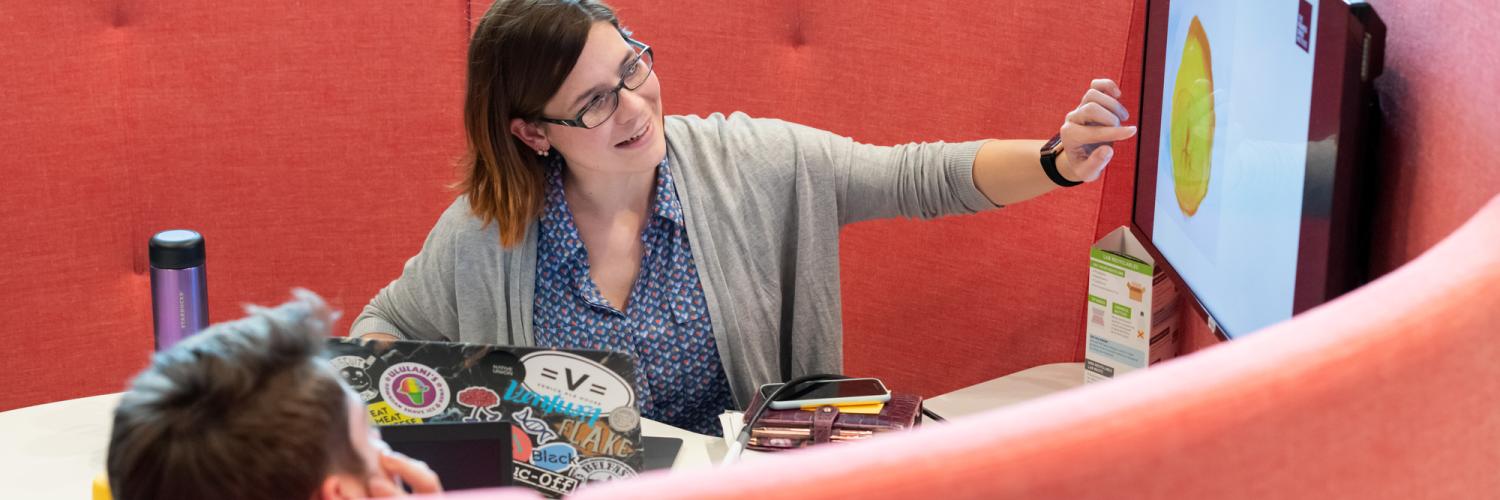 Researchers in a collaboration space at the Crick.