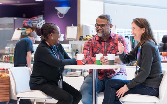 People having coffee in the cafe at the Crick	