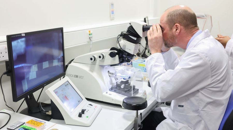 The Prince had a go at slicing a sample for electron microscopy using a very thin slicer called an ultramicrotome, instructed by Dumisile 