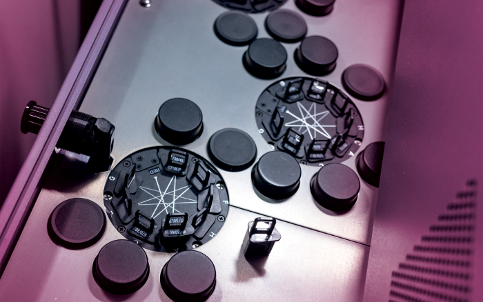 A lab machine with a pink effect on it